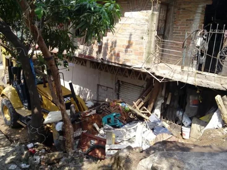 Limpian de Nuevo Domicilio de Acumulador de Basura