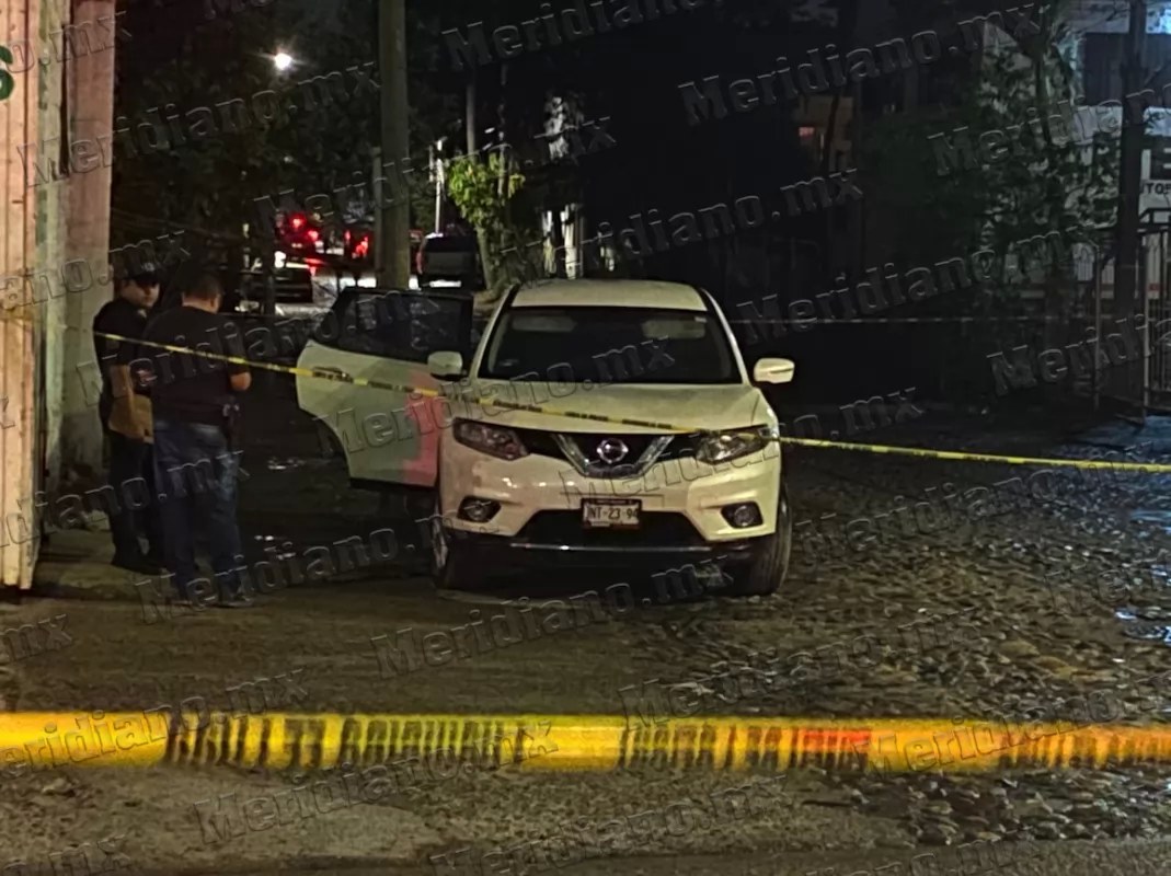 Mujer asesinada dentro de una camioneta